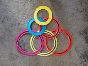 Triangle of 6 flying rings photographed on the floor