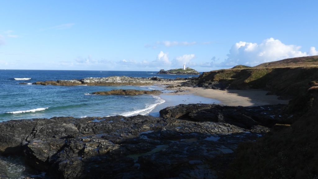 Photo of St Ives Bay with the iconic Godrevy Lighthouse that inspired Virgina Wolff's book to the Lighthouse where PT's CDR AOE geoengineering project is planned 